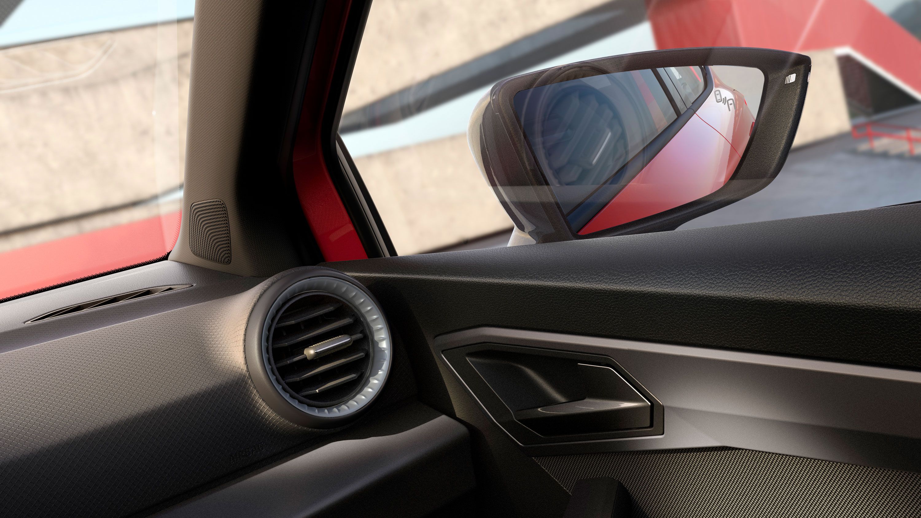 Teilansicht des Innenraums mit einigen Details und dem rechten Außenspiegel.